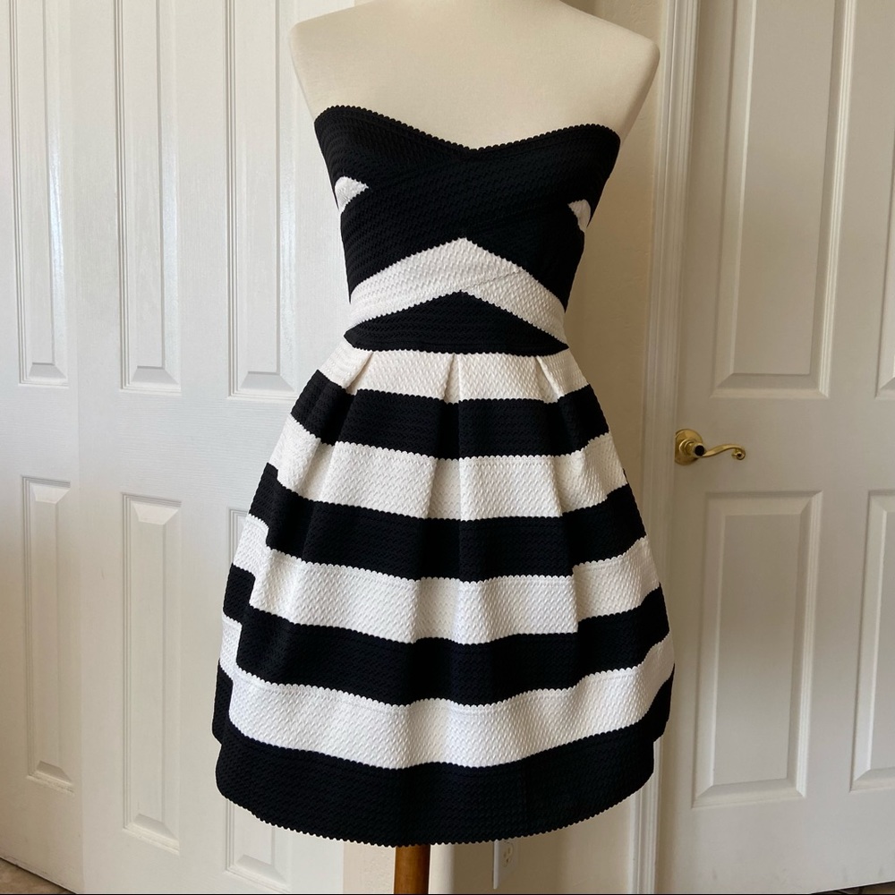 Strapless Vertigo cocktail dress, new without tags